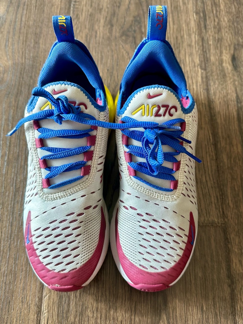 Nike Kids Sneakers in White, Pink, Blue, and Yellow
